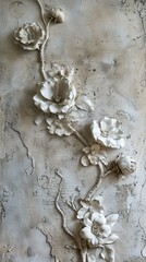 A wall adorned with light decorative plaster and embossed flowers a dance of texture and form