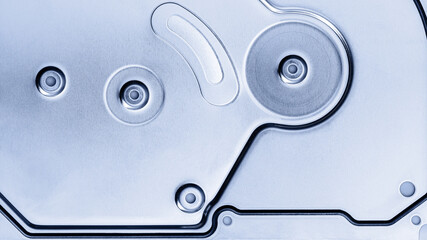 closeup view of hard drive lid. brushed metal texture. industrial background. - 784947276