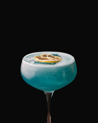 A refreshing and visually stunning blue mocktail. This vibrant non-alcoholic beverage features a...