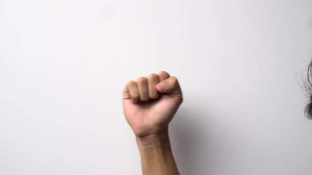 Man's hand waving to leave on white background