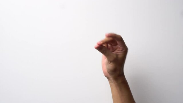 Man's hand snapping finger sign symbol on white background