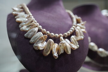 A necklace made of mother-of-pearl stones.