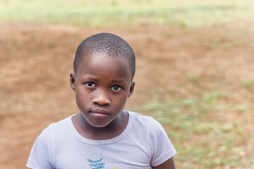 portrait of a child in the yard in south african village