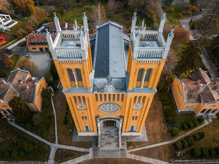 Fot, Hungary - Aerial view of the Roman Catholic Church of the Immaculate Conception (Szeplotlen Fogantatas templom) in the town of Fot on a sunny spring day
