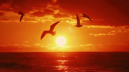 Sunset birds flying, ocean backdrop, close-up, low angle, silhouettes against fiery sky 