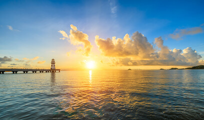 Beautiful coastline and lighthouse building landscape at sunrise in Zhuhai, China. famous travel destinations. Panoramic view.