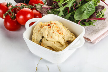 Creamy hummus in the bowl