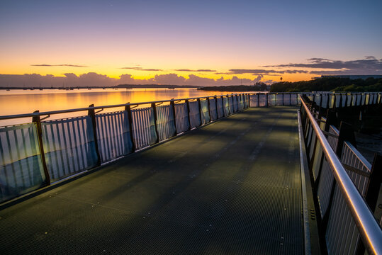 Coastal walkway bridge at sunrise / blue hour
