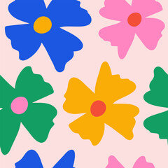 Seamless pattern with colorful groovy daisy flowers on a pastel background. Vector illustration.