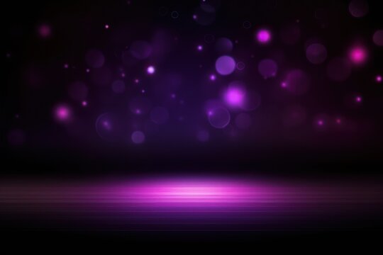 Abstract glowing light violet bokeh on a black background with empty space for product presentation