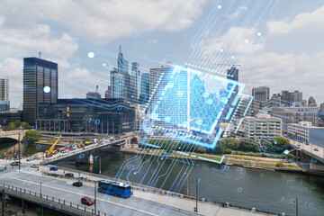 Philadelphia cityscape with a holographic projection of digital data, Photo manipulation on a clear sky background, Technology and future concept. Double exposure