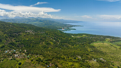 Naklejka premium Coastline of Negros Island with towns and villages. Philippines.