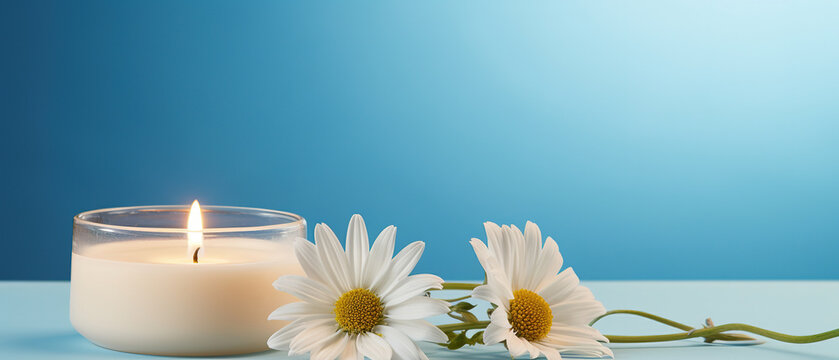 commercial photography, candle, placed on circular beige platform, with light blue background, daisy flowers around