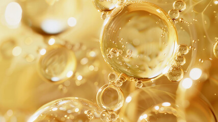 macro shot of golden oil skincare collagen bubbles, creating a luxurious and abstract pattern with...