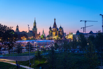 Fototapeta na wymiar Saint Basil's Cathedral in Red Square and Kremlin from New Zaryadye Park in Moscow, at nightfall
