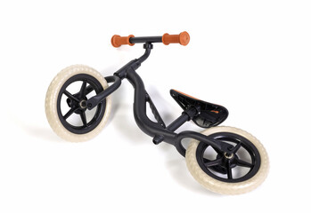 Used modern black balace bike for a small child, isolated - 785040284