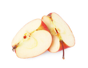 Pieces of ripe red apple isolated on white, top view