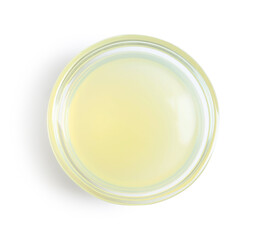 Refreshing lemon juice in glass isolated on white, top view