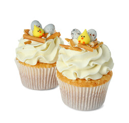Tasty Easter cupcakes with vanilla cream isolated on white