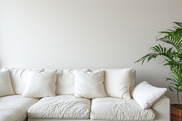 White and beige living room seating with empty wall