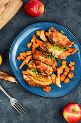 Homemade meat roll with apples and sweet potatoes.