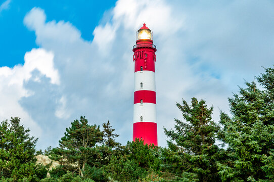 Germany, Schleswig-Holstein, Amrum, Amrum Lighthouse standing against clouds