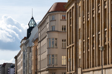 Facades of buildings and streets of European cities. Beautiful European buildings.