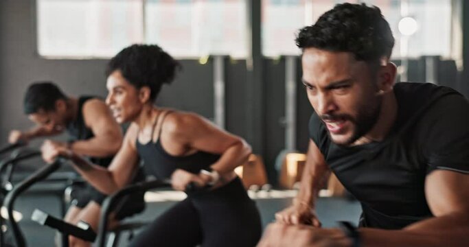 Friends, workout and gym together with determination for stamina, training and exercise to build muscle on arms or legs. People, crosstrainer or cycling bike for cardiovascular strength and endurance