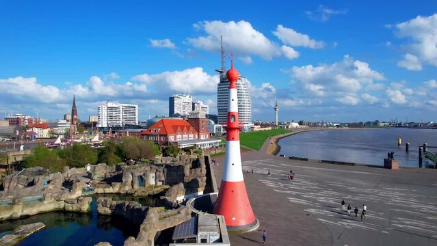Bremerhaven - Minaret lighthouse at the animal park - flight to the lighthouse with the city skyline in the background
