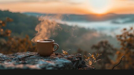 Early morning coffee on a rocky ledge with a warm sunrise enveloping misty mountains in the background. - obrazy, fototapety, plakaty