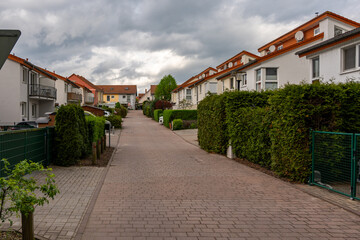 Residential sector of a European country. Residential yard on a cloudy day.