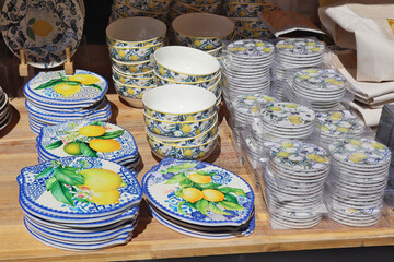 Ceramic souvenirs with lemons in gift shop in Menton, France