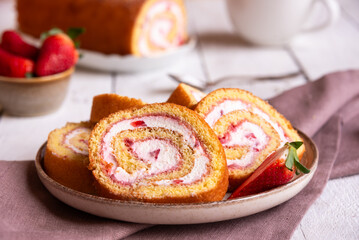 Swiss roll with strawberries and cream, homemde dessert - 785081050