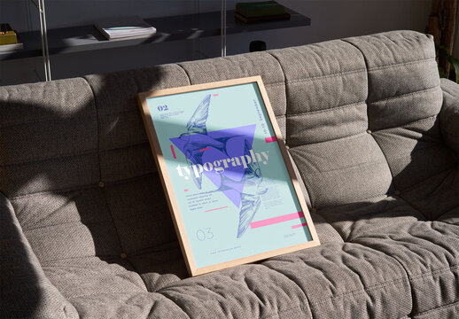 Mockup of vertical customizable poster frame on couch
