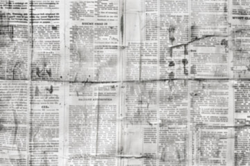 Blurred newspaper collage for wallpapers and backgrounds.	