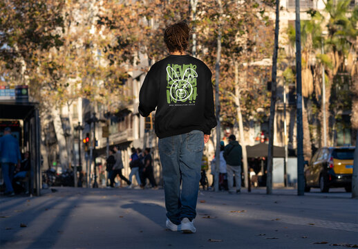 Mockup of man wearing customized sweatshirt, rear view
