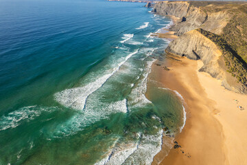 Aerial droe view of beautiful natural Cordoama beach in Portugal Atlantic coast - 785094445