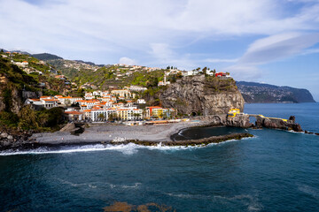 Ponta do Sol in Madeira Island, Portugal. Aerial drone view at cityscape of coastal town and beach - 785095624