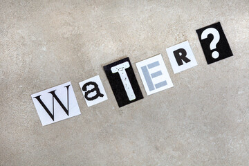 South Africa’s next big headache, water problems
The word water, in magazine cutouts on mottled grey.
