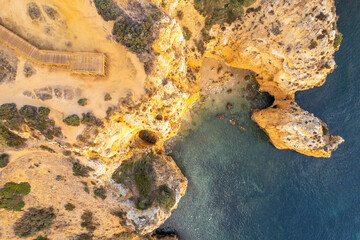 Sunrise over Ponta de Piedade, Algarve cliffs on coastline. Aerial drone view - 785096425