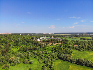 aerial view of summer green forest surrounding Savvino-Storozhevsky Monastery in Zvenigorod, Moscow region, Russia