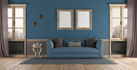 Elegant living room interior with blue sofa and blank frames - 785100686