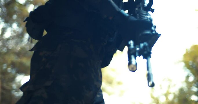 Armed Guard Patrolling with Military Equipment