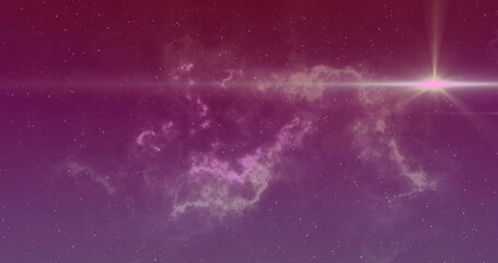Obraz premium Image of light spots and trails on purple background
