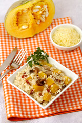 Pumpkin risotto with mushrooms.