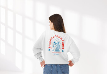 Mockup of woman wearing customizable sweatshirt, rear view