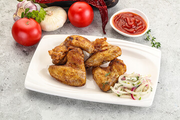 Grilled chicken wings with sauce