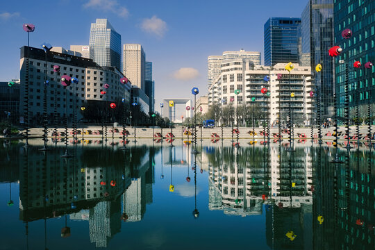 Paris, France - March 6, 2024. Takis Pool with sculptures and reflection in La Defense, a major business district of Paris, France. 