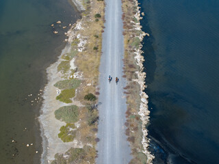 Drone Photo of Cyclists Advancing on the Bird Sanctuary Bicycle Path, Izmir T&uuml;rkiye (Turkey)