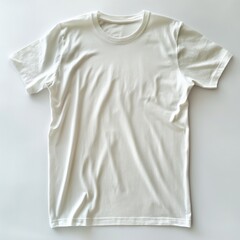A plain white t-shirt lies flat on a white surface, ideal for design mockups and fashion presentations.